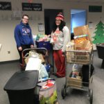 Sarah and Tearisa tally pantry items received
